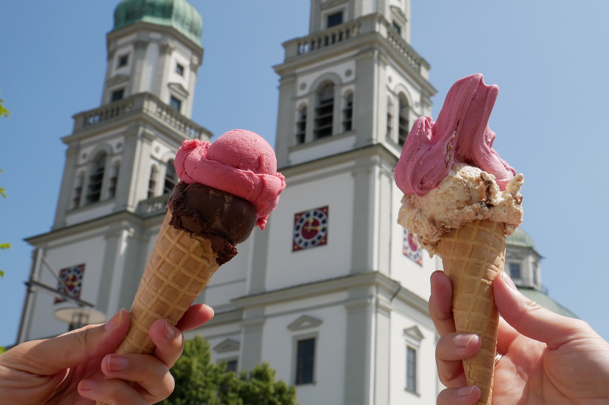 Ice cream in a cone in front of Basilica of St Lorenz