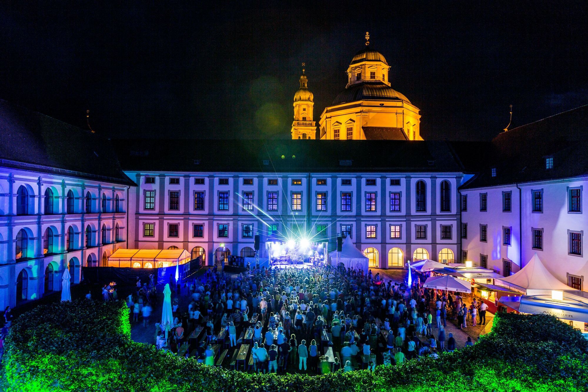 picture of a concert in front of the residence