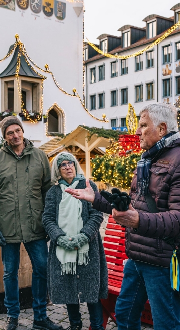 The beautiful Christmas market behind the fountain
