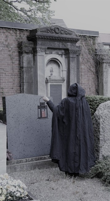 A mysterious person in the cemetery